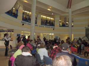 Spectators watching a band play music