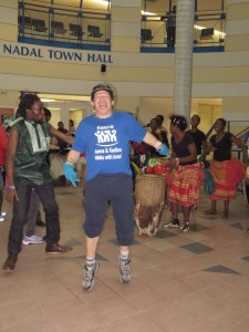Band playing with man dancing.